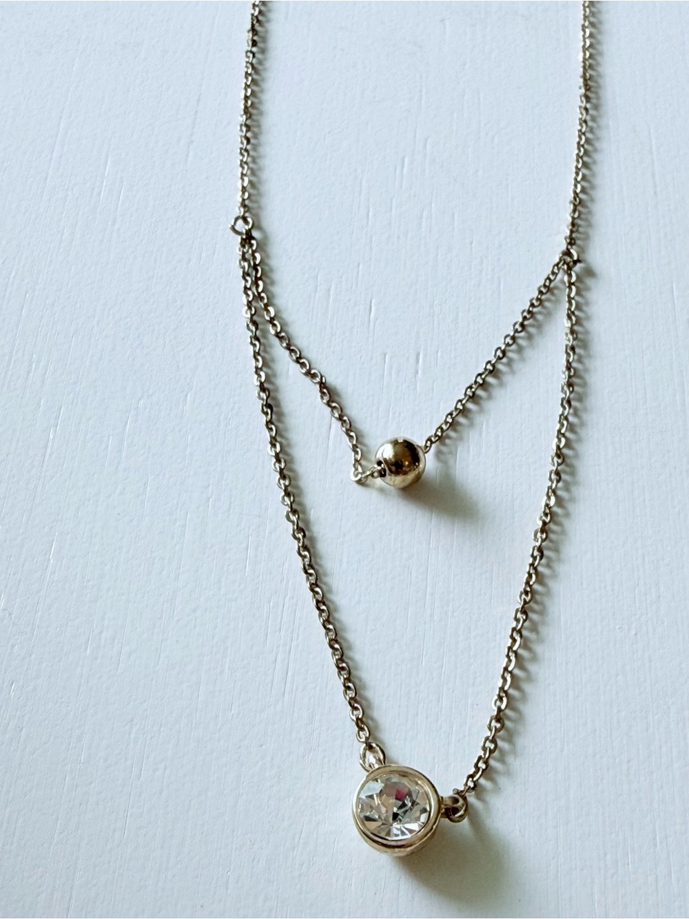 Layered Gold-Tone Necklace with Clear Crystal Pendant